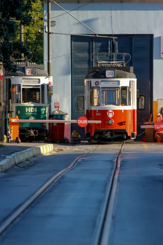 two trolleys sit in front of a loading dock