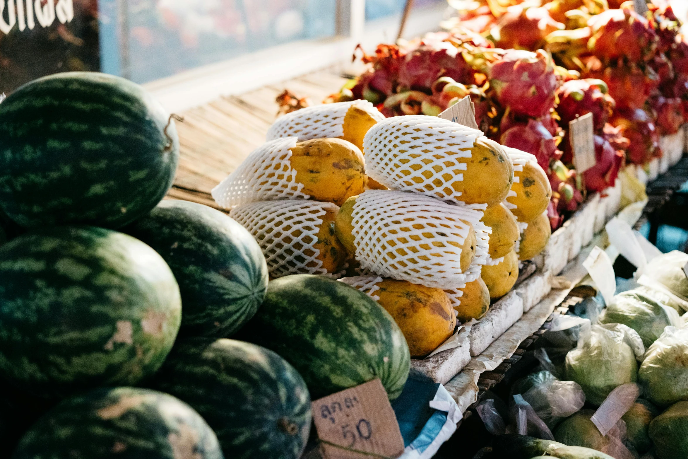 fruits are displayed on display at a farmer's market