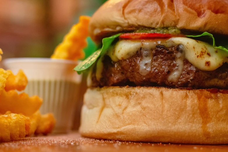 a burger sitting on top of a wooden counter