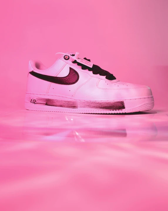 a pink background with a nike air force sneakers