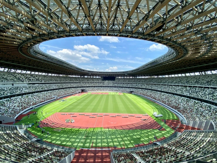 the inside of a baseball stadium with a green field