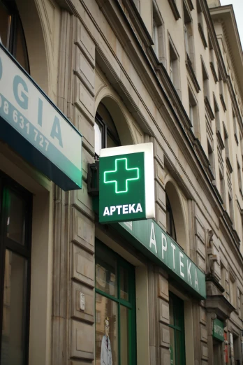 the sign above the store for apjeka is clearly visible