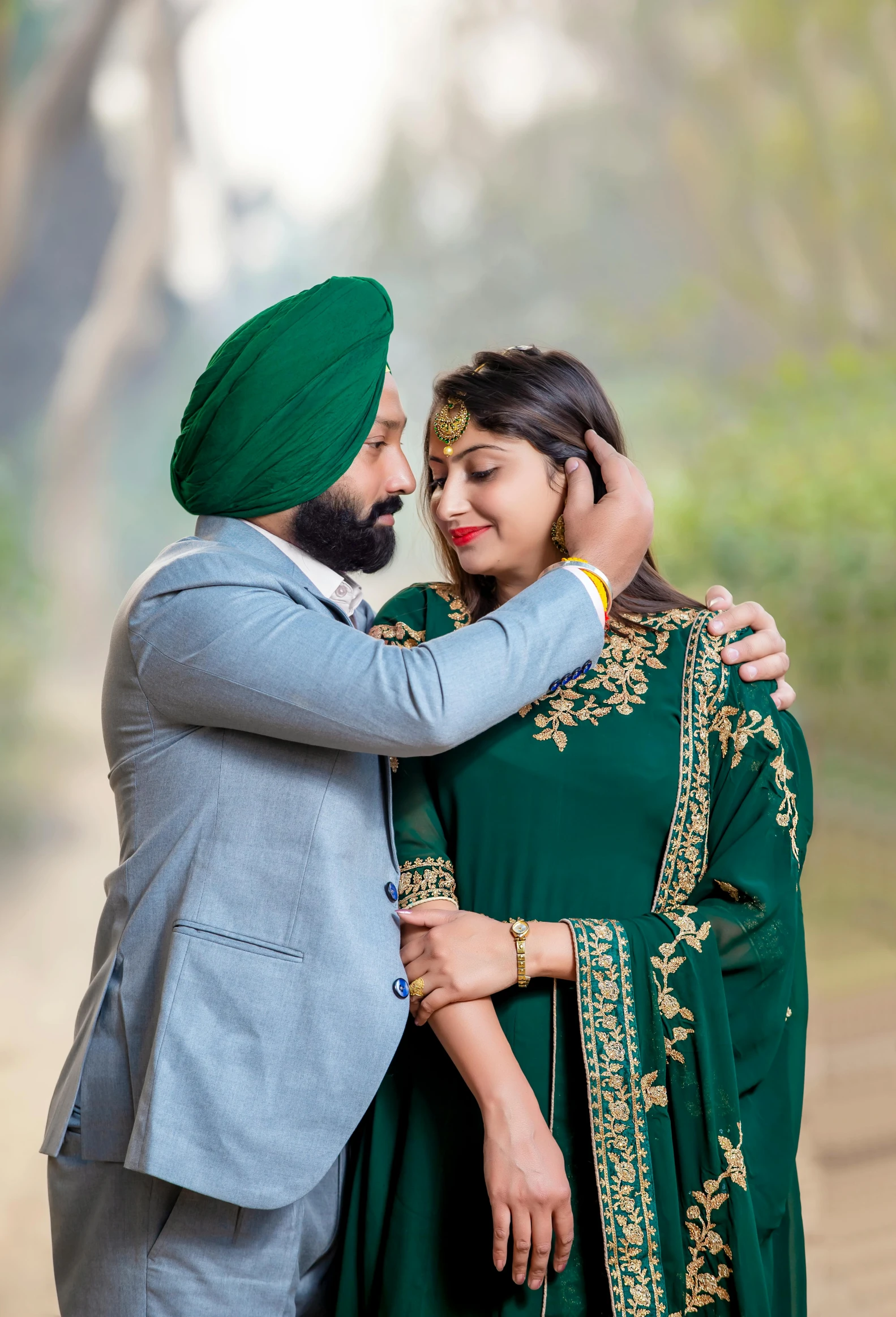 a young indian couple emcing during their engagement po shoot