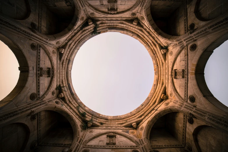 a view through the round windows of a building