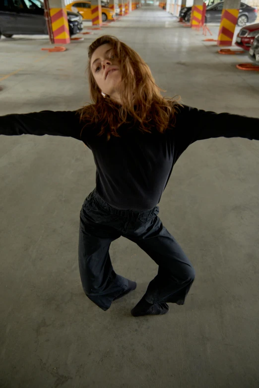 a woman who is standing in the garage