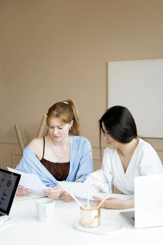 two women are in the middle of a meeting