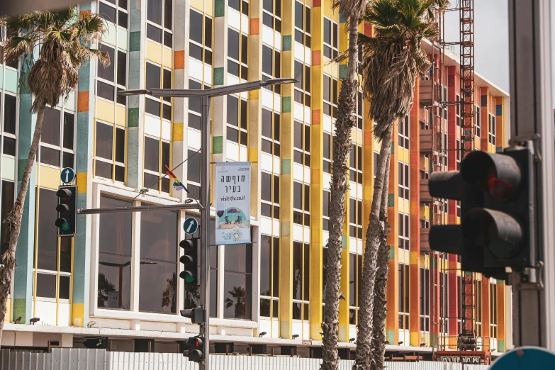 colorful buildings on the corner of an intersection