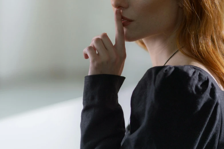 a woman standing up looking into the distance