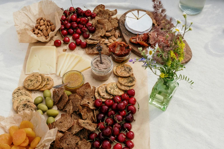 various ers, nuts, and fruits sitting on top of a table