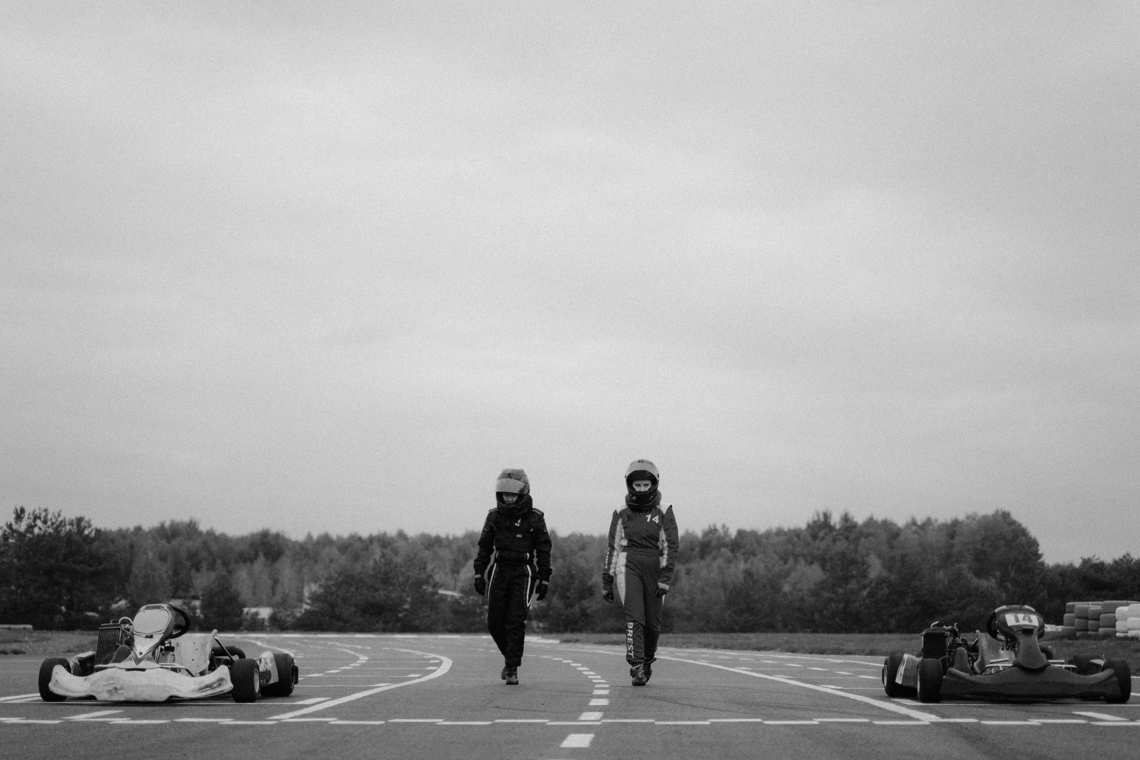 a group of people on a racing track