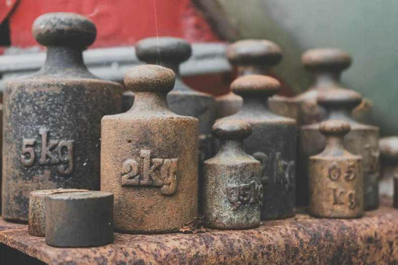 various antique items sitting on a shelf on display