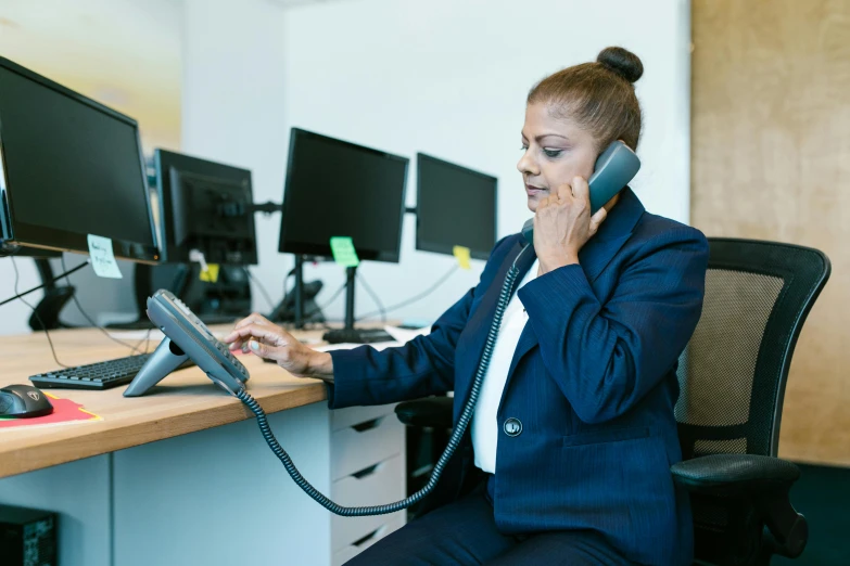 an african american business woman on the telephone