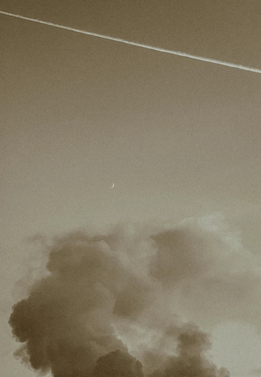 smoke from a chimney billowing out smokestacks