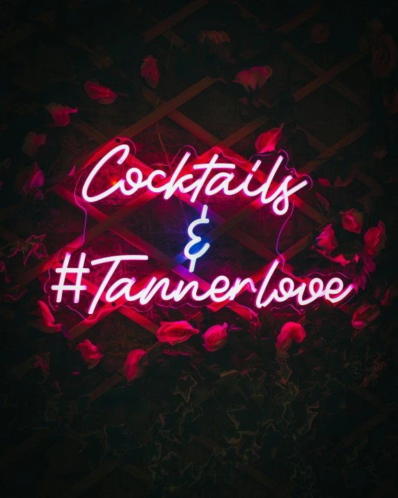 a neon sign with a word underneath it that says cocktail and tannerwise