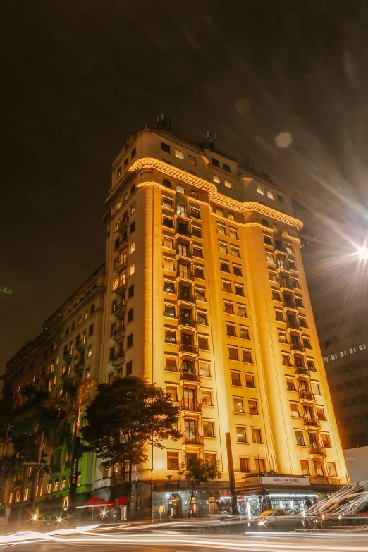 a lit up building in the night time