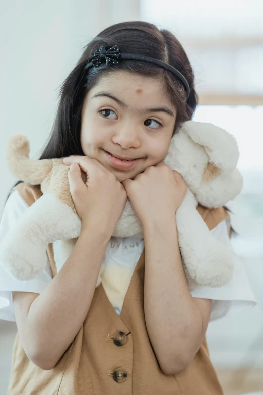 girl in school uniform wearing a pair of bear ears