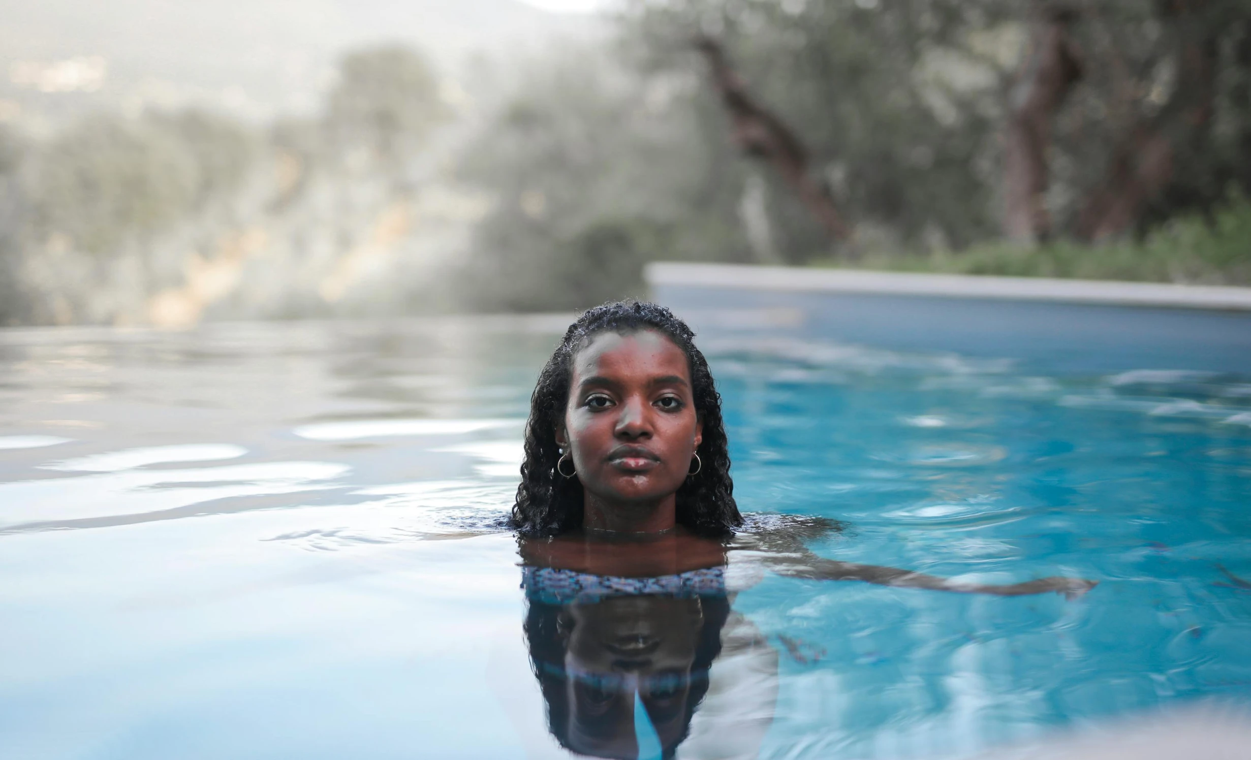 a young woman that is in some water