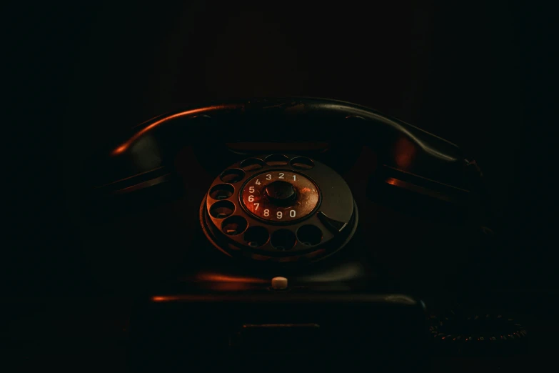 a close up of an old style telephone