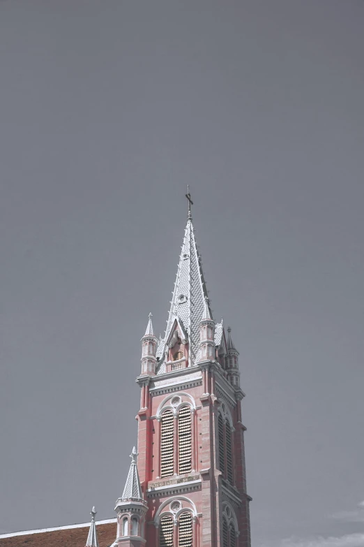 an old building has snow on it's steeples