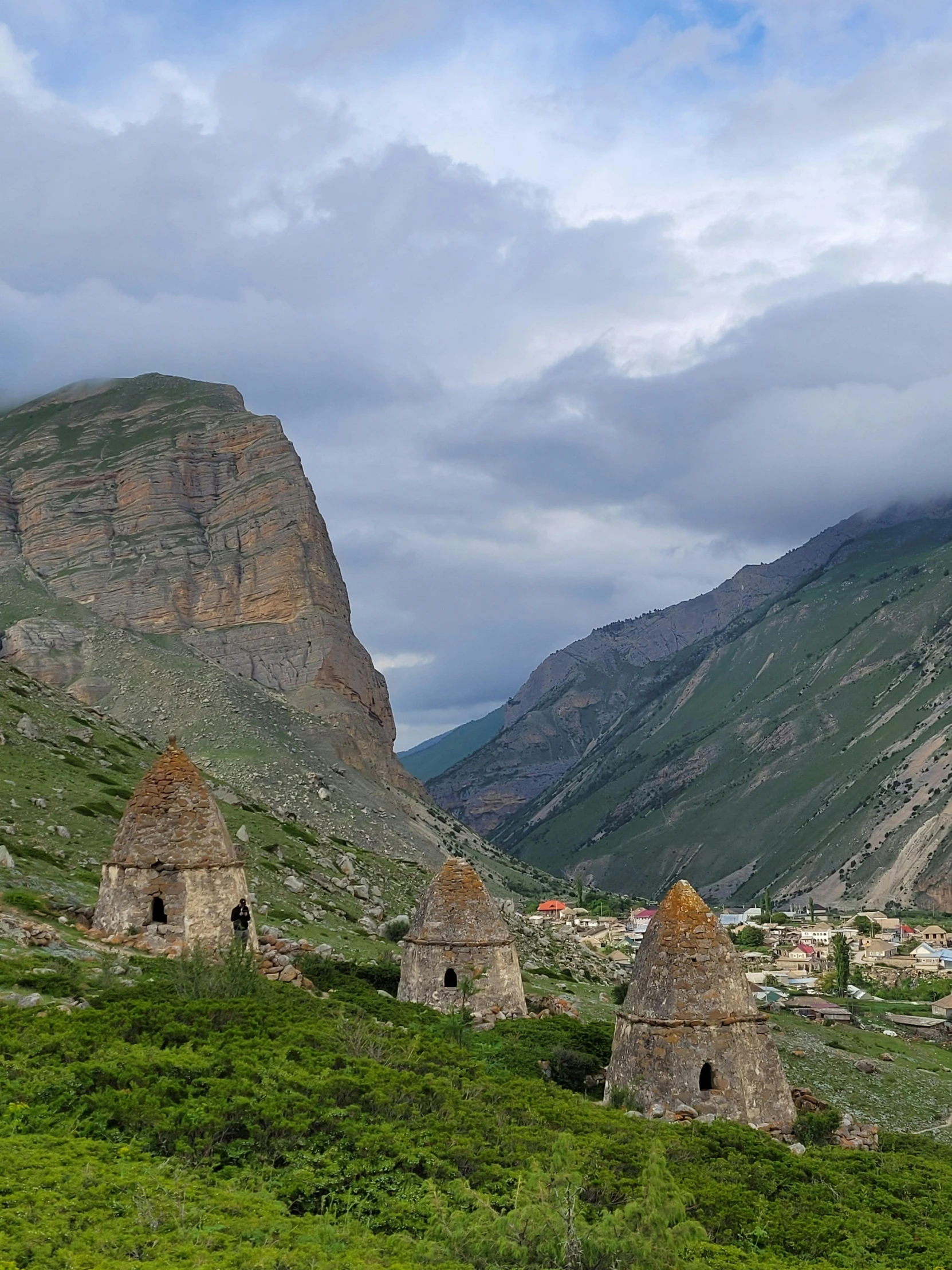 an image of the hills surrounding an old abandoned village