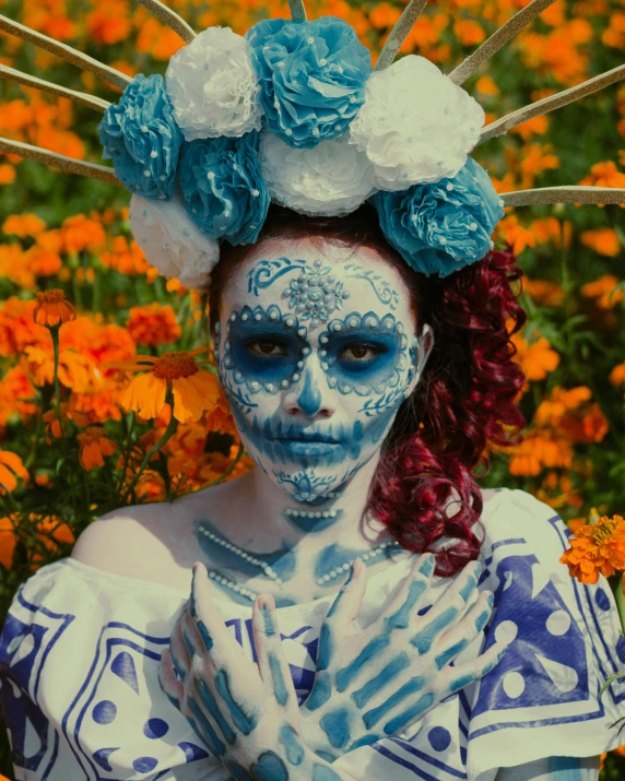 a girl with a blue and white costume