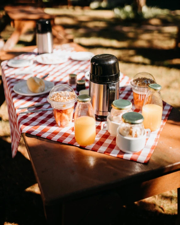 some drinks and other food are on a table