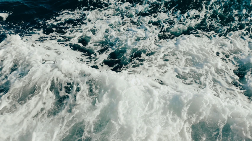 a large body of water filled with lots of waves