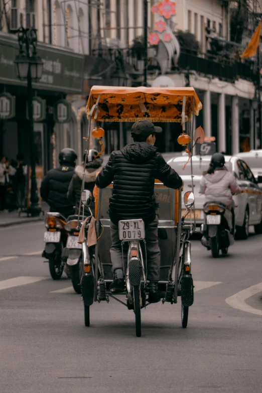 some people riding motorcycles in the middle of the street