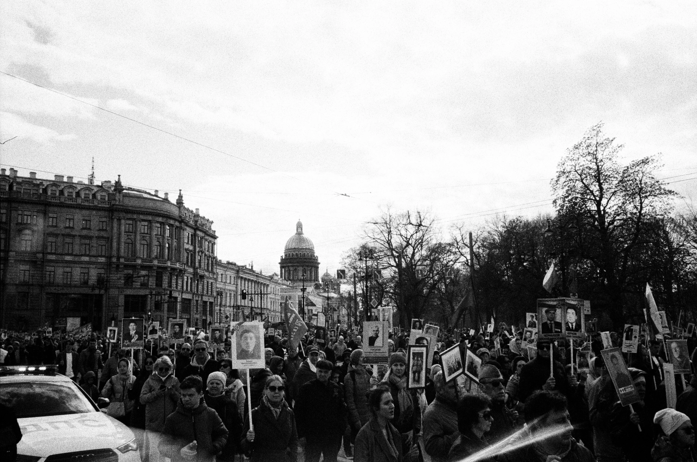 people marching in the streets with their protest signs