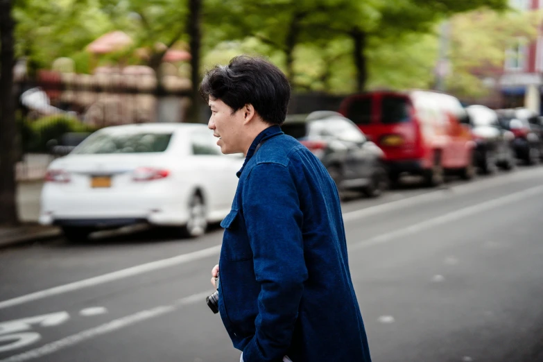 man walking down the street on a busy day