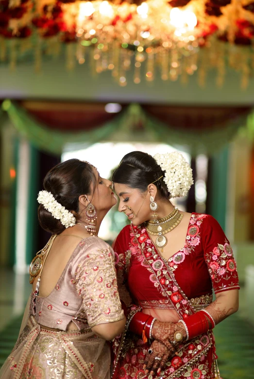 a couple of women standing next to each other