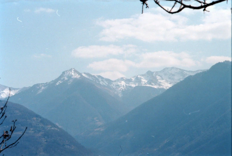 a very tall mountain with lots of snow on top