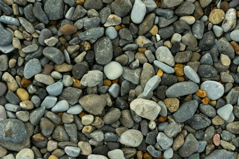 many different colored stones and rocks are displayed together