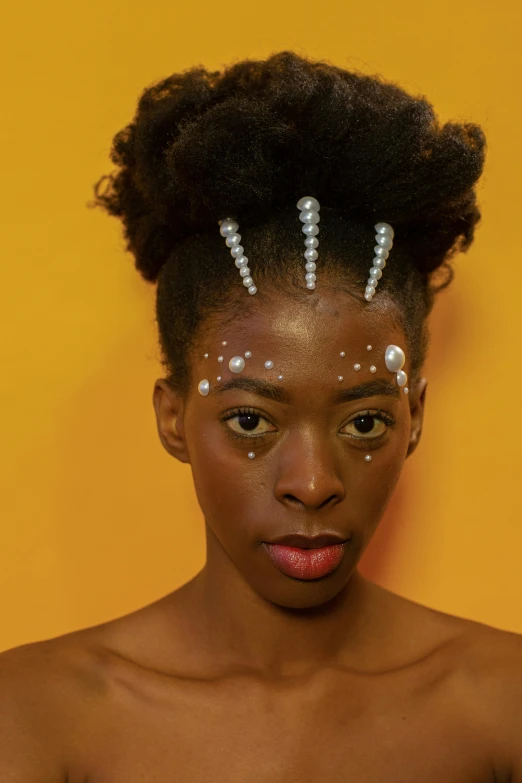 a woman with two pins on her head