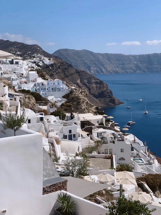 a view of some buildings in a body of water