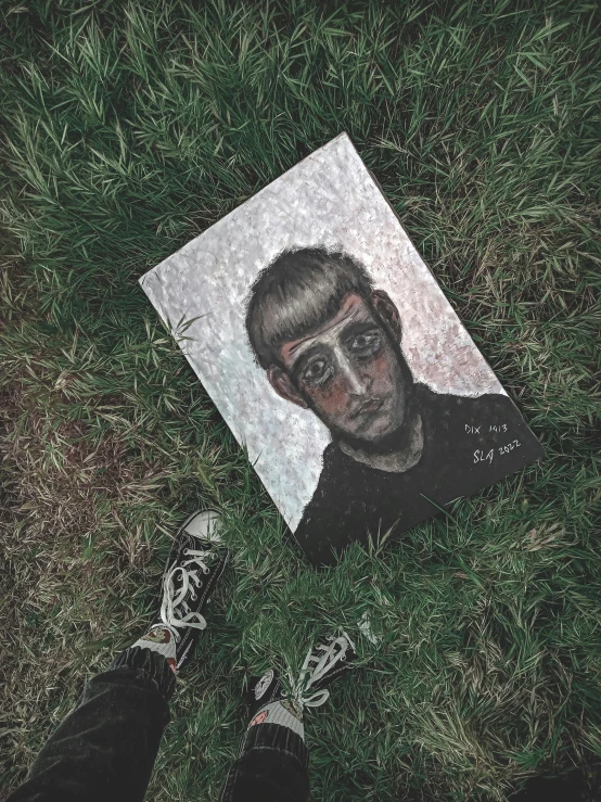 the po of a man is placed in the grass