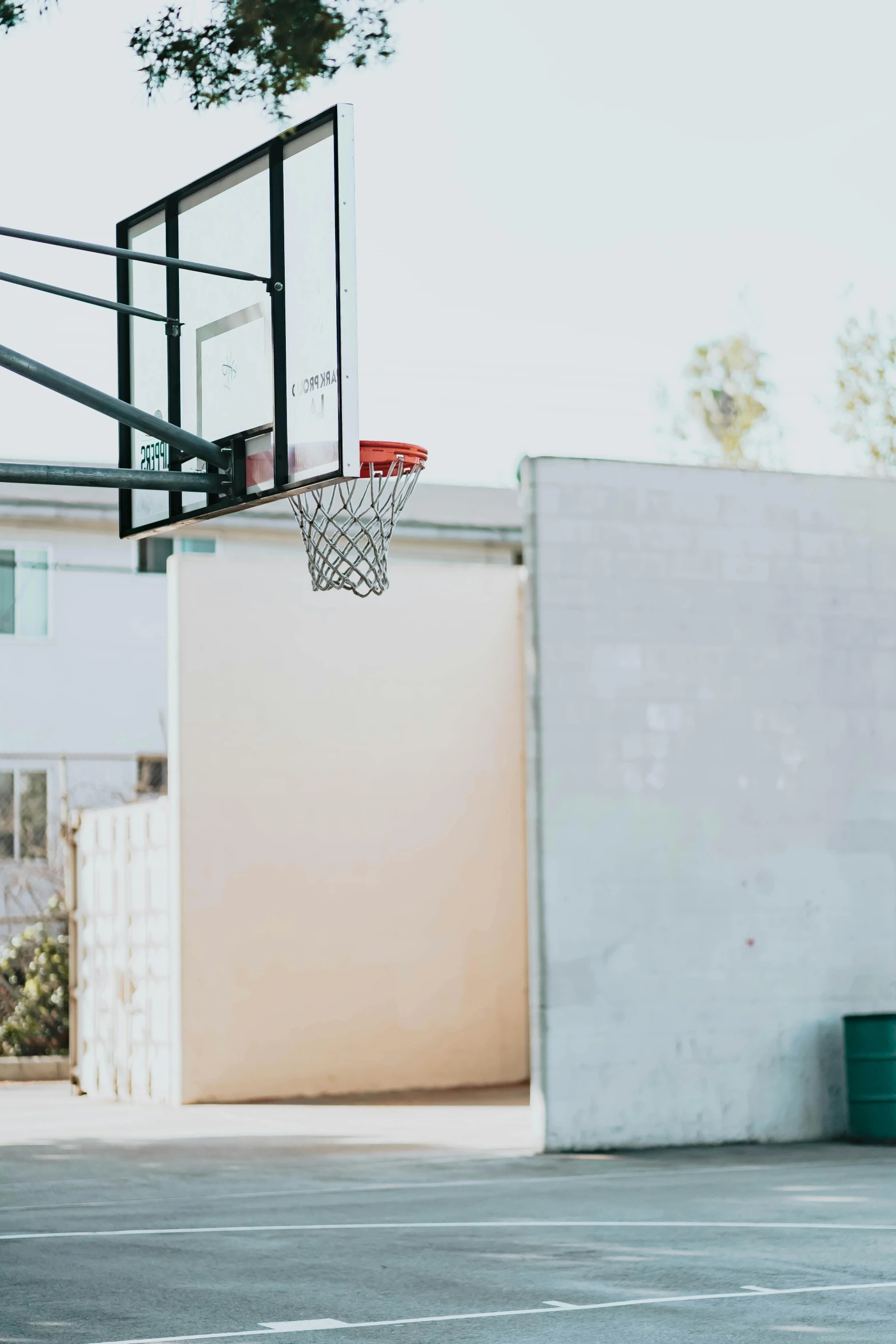 someone playing with a basketball while jumping high in the air