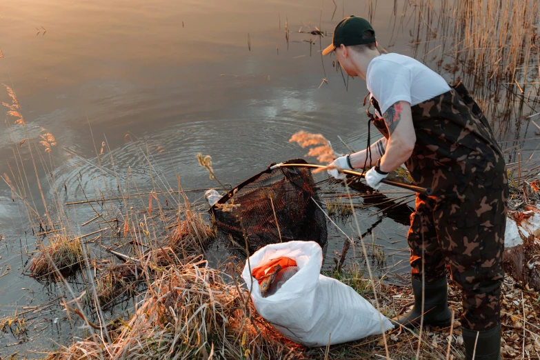 an individual is working with soing in the water