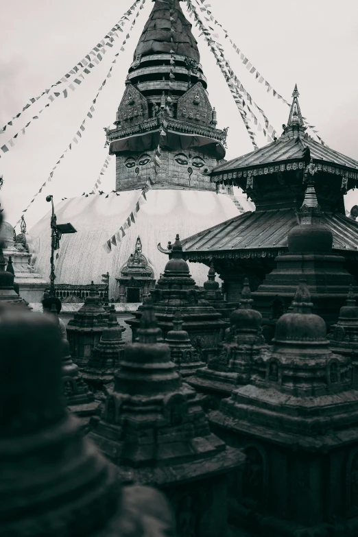 a pagoda in the middle of some city buildings