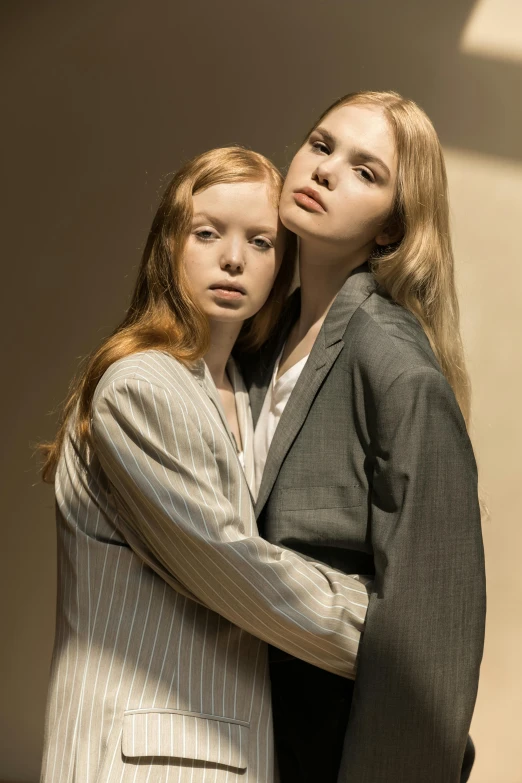 a couple of young women posing for a po