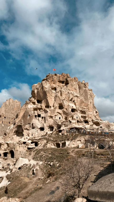 a view of a cliff that is made from rocks