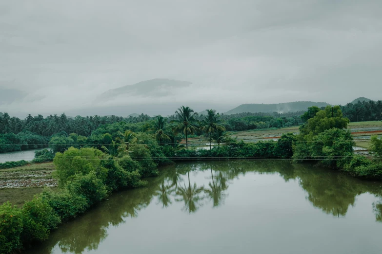 view over calm waters with mountains in the distance