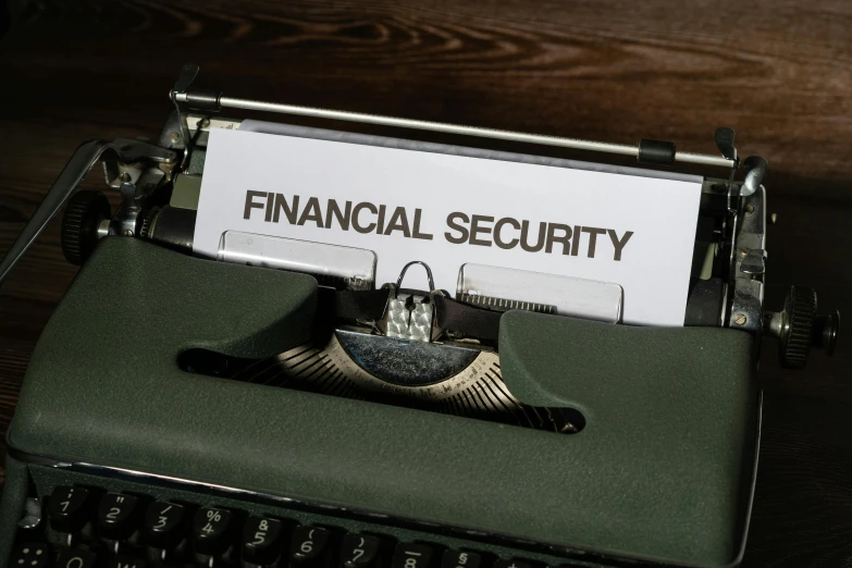 financial security on paper on top of old typewriter