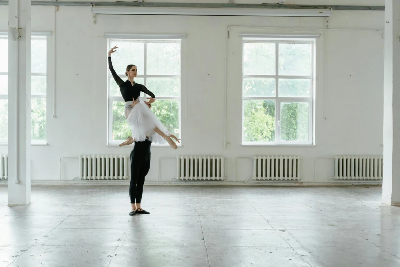 an image of two dancers performing on stage