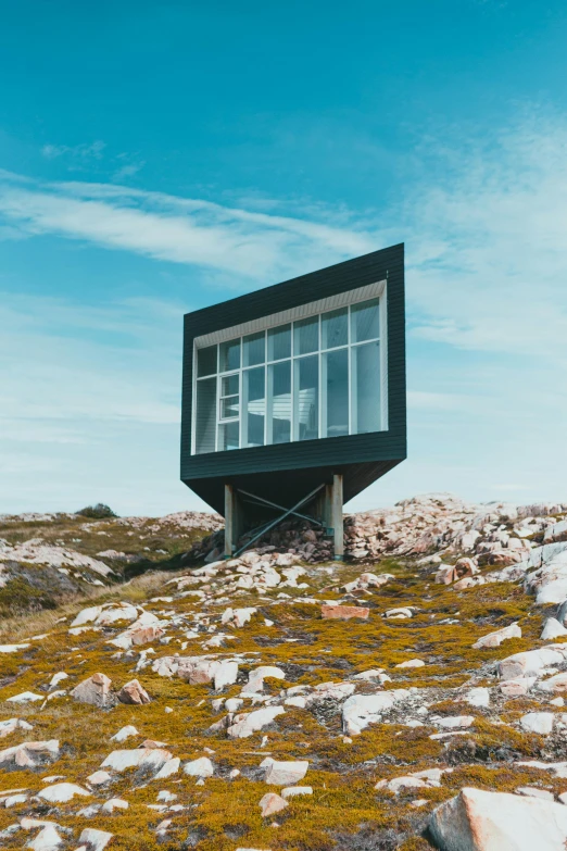 the structure is sitting on the side of a mountain