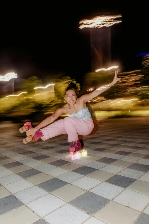 a person riding on the top of a skateboard
