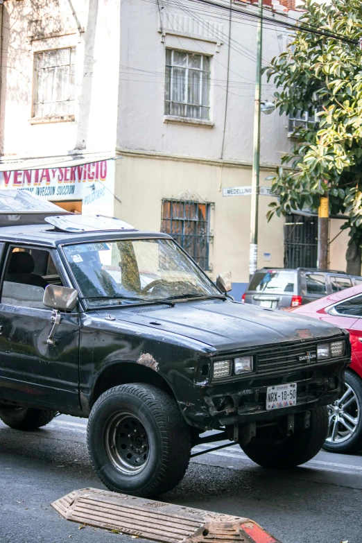 the old truck has had been painted black