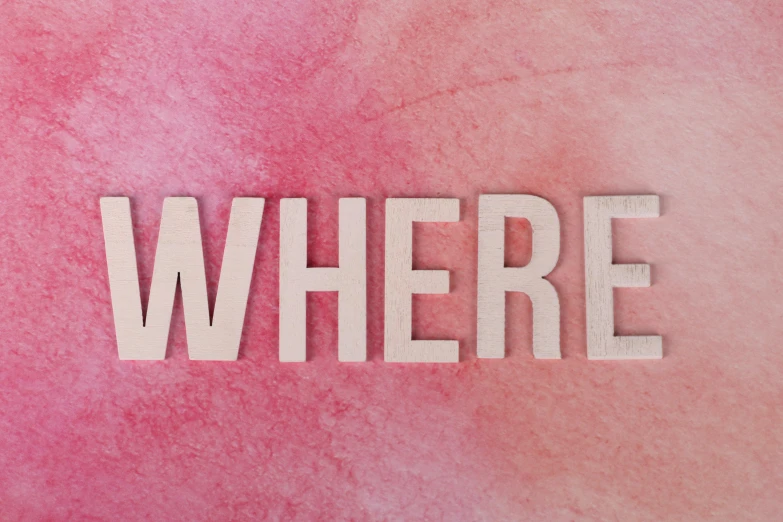 the word where is the color on a pink watercolor background