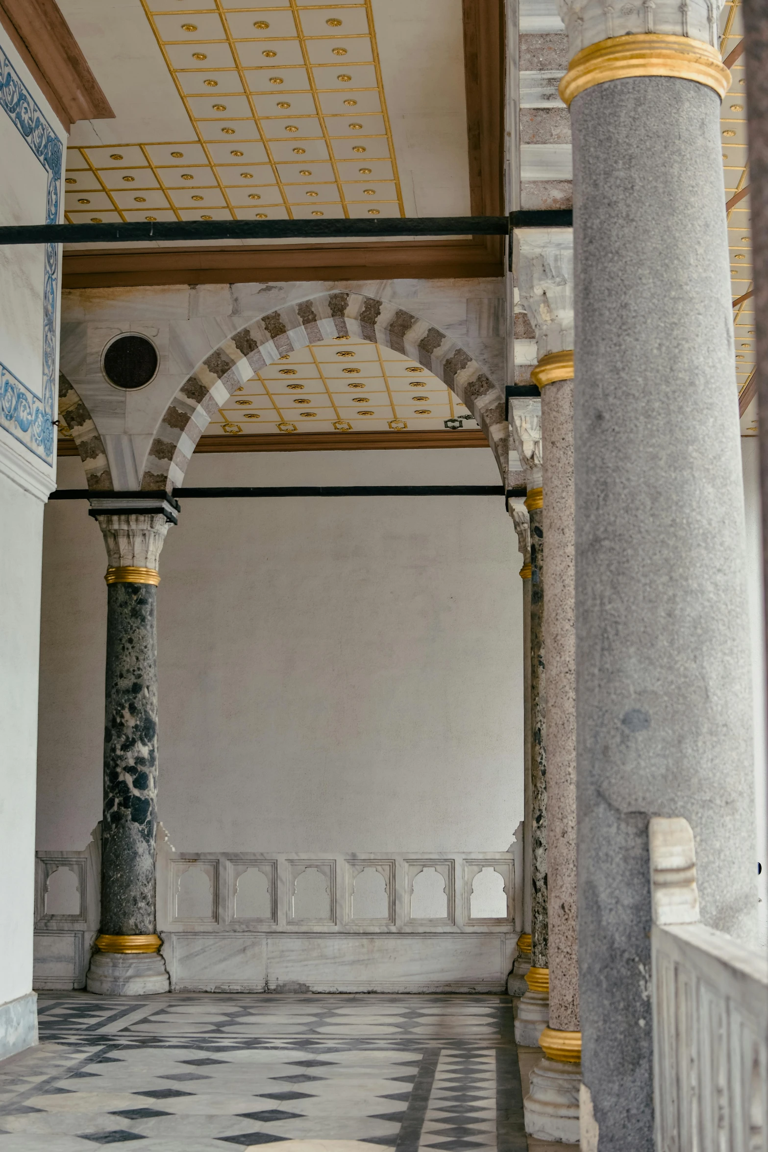 an old fashioned hallway in an old palace