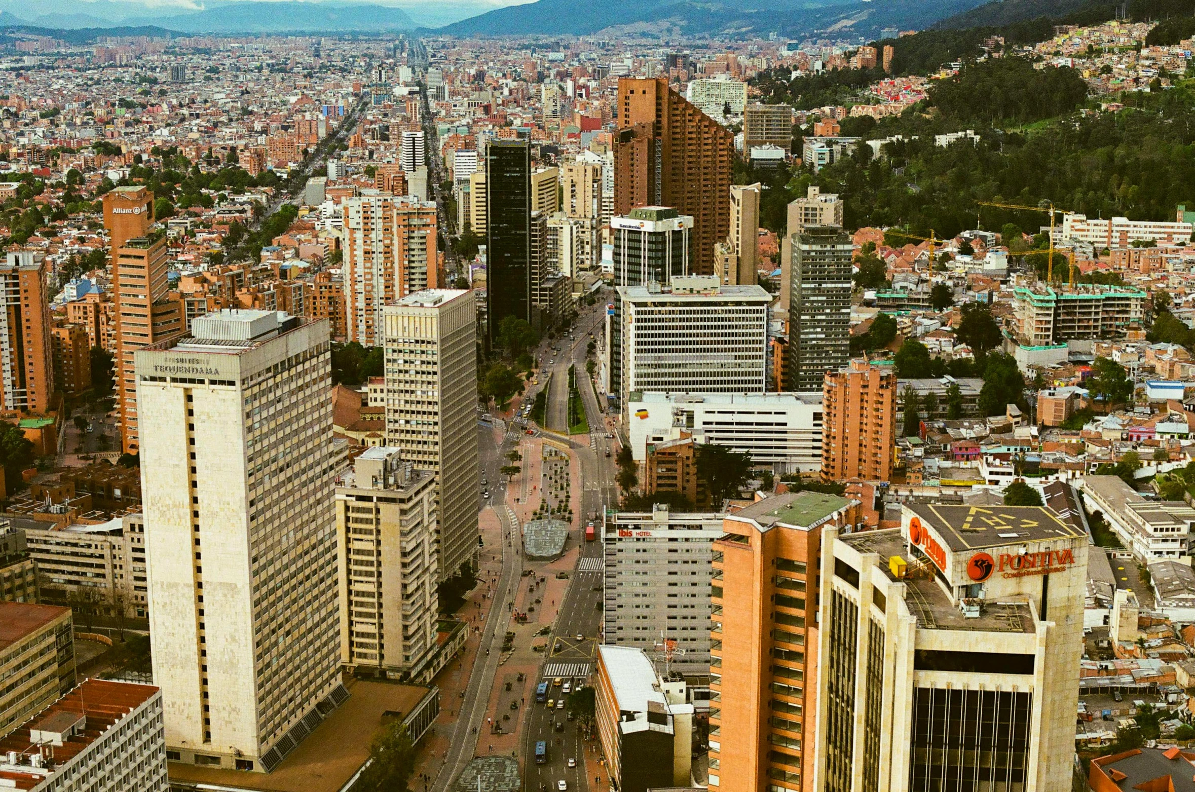 a view of cityscape and some mountains